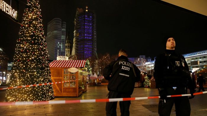 Police secure the area at the site of an accident at a Christmas market in Berlin