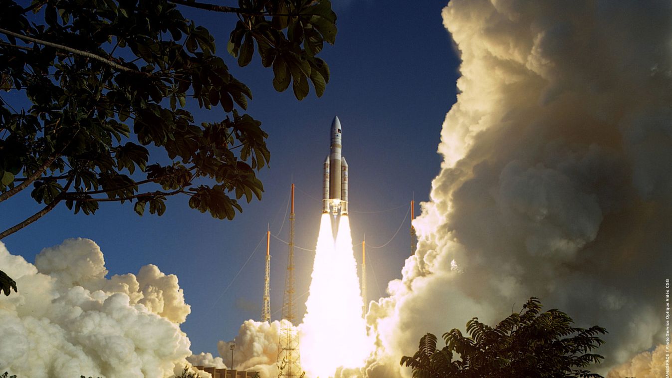 An upgraded Ariane-5 rocket blasts off from Kourou in French Guiana, late February 12, 2005 before s..