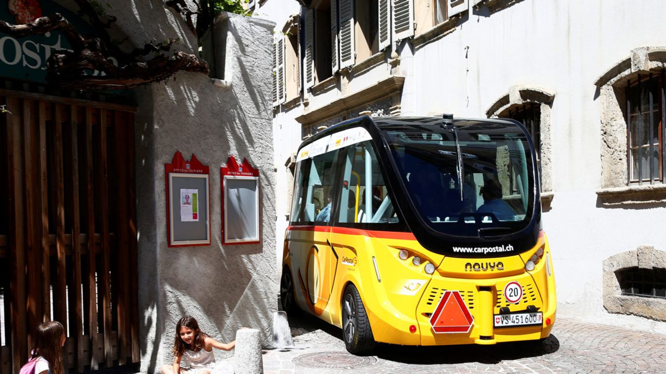 The first autonomous and electric shuttle of PostAuto Schweiz cruises in the old village of Sion
