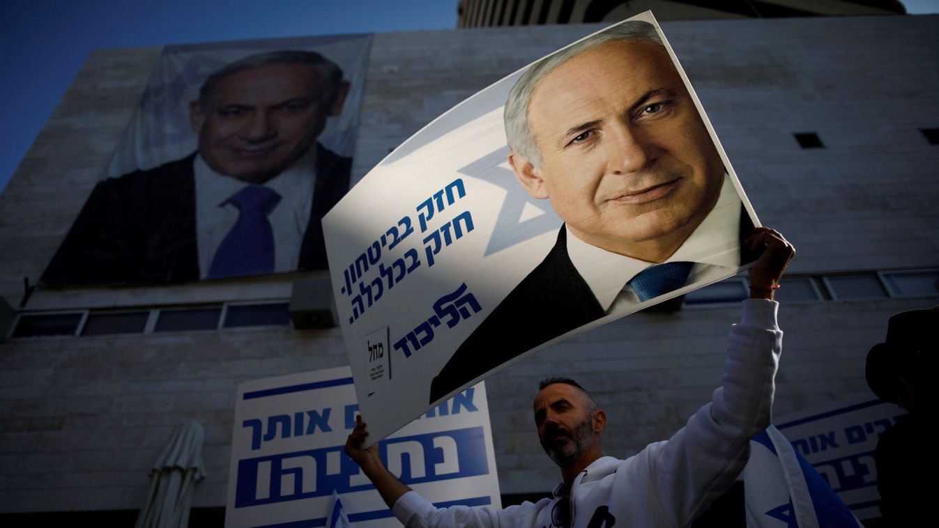 Supporters of Israeli Prime Minister Benjamin Netanyahu protest outside Likud Party headquarters in Tel Aviv