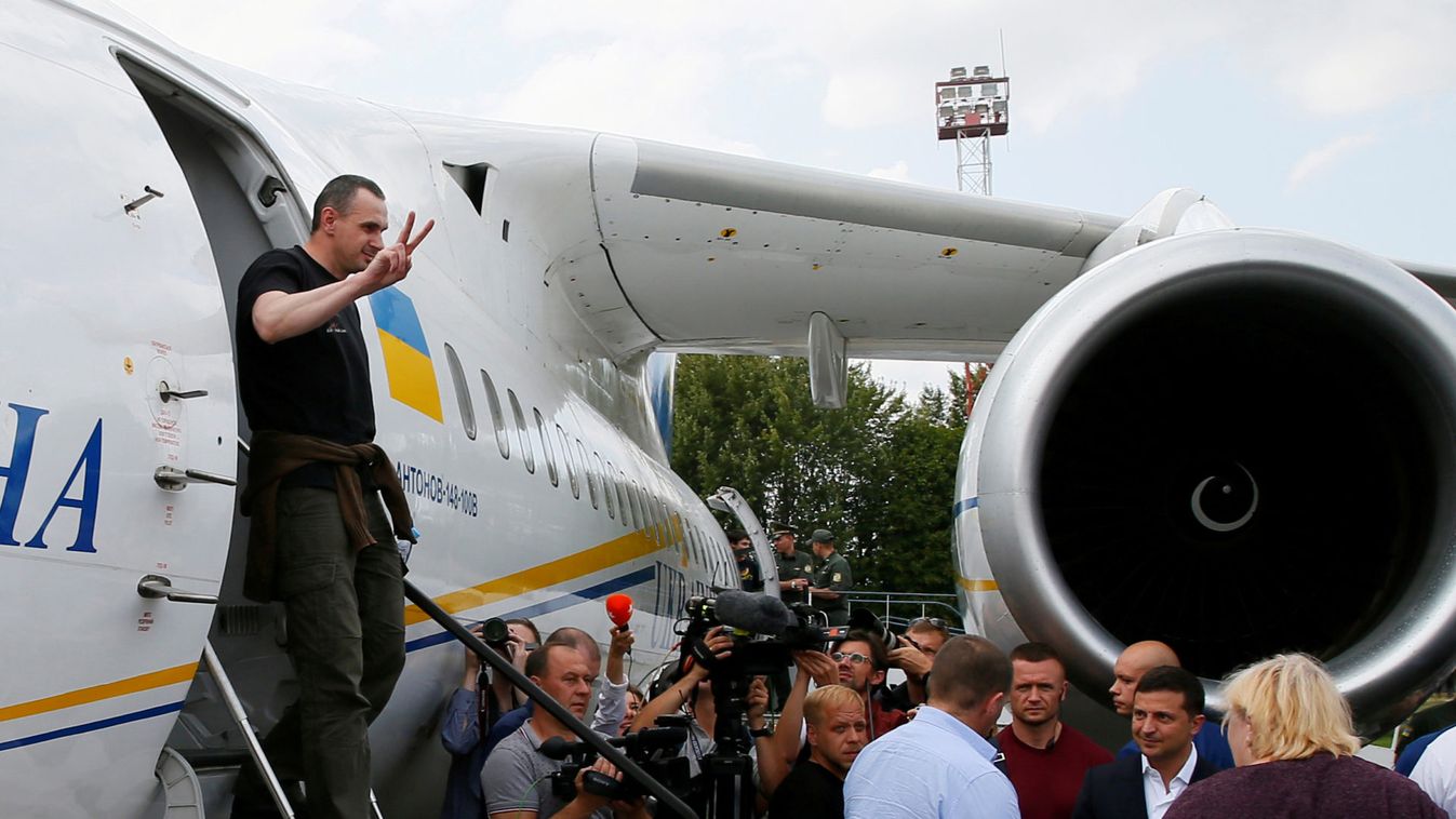 Ukrainian film director Oleg Sentsov, who was jailed on terrorism charges in Russia, gets off a plane upon arrival in Kiev after Russia-Ukraine prisoner swap, at Borispil International Airport