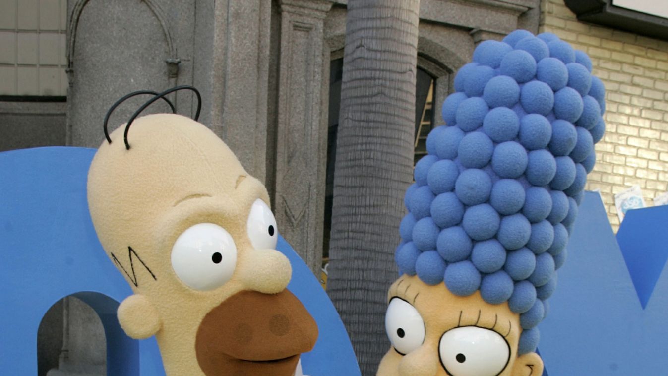 Homer (L) and Marge Simpson, married characters from the Fox television network animated television ..