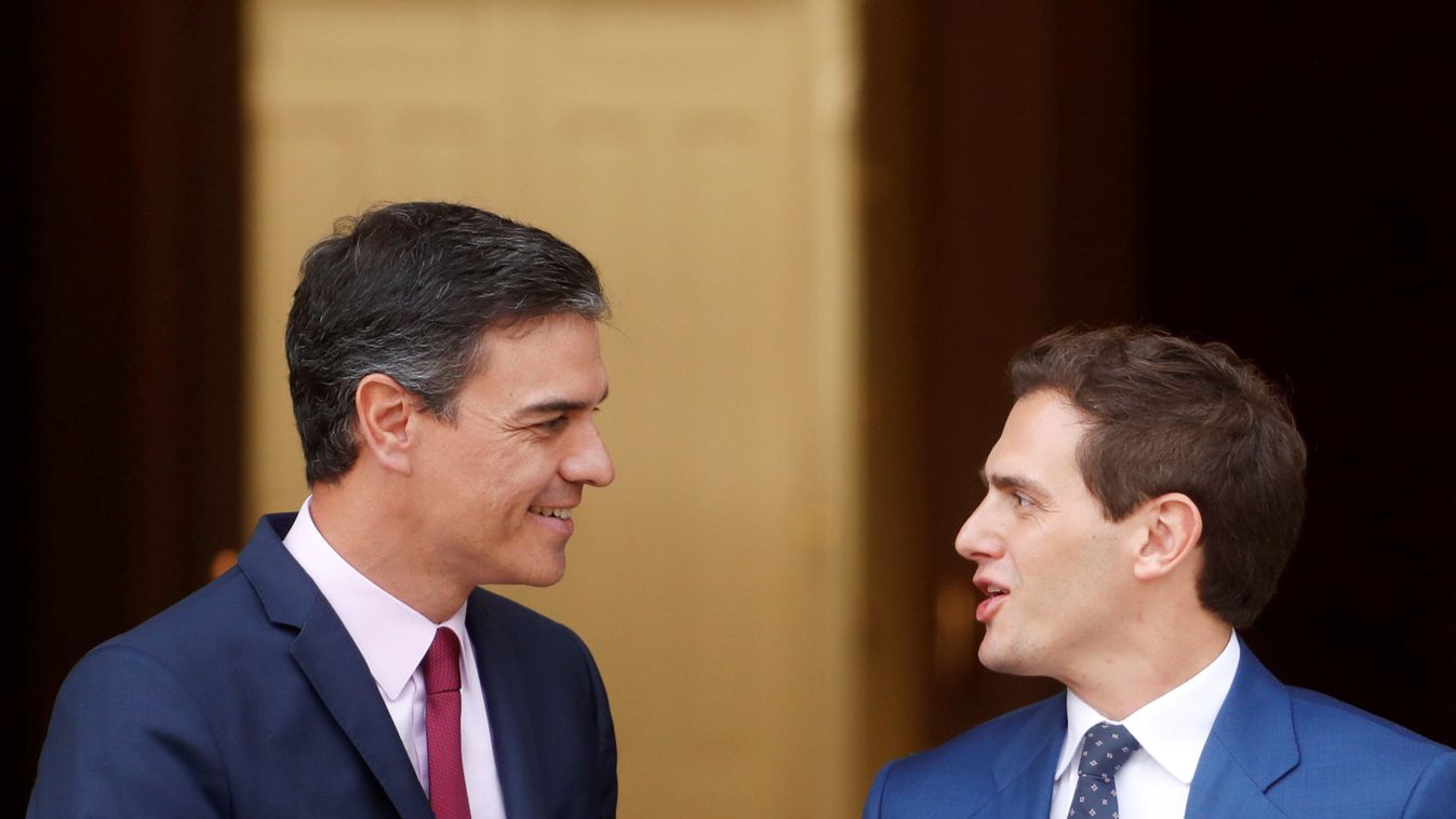 Spain's acting PM Sanchez greets Ciudadanos leader Rivera at the Moncloa Palace in Madrid