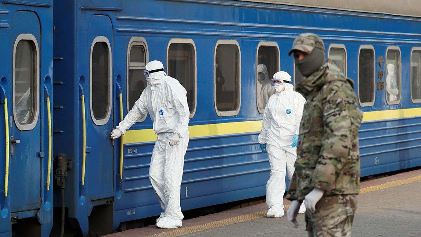 Ukrainian citizens evacuated from Russia arrive at the railway station in Kiev