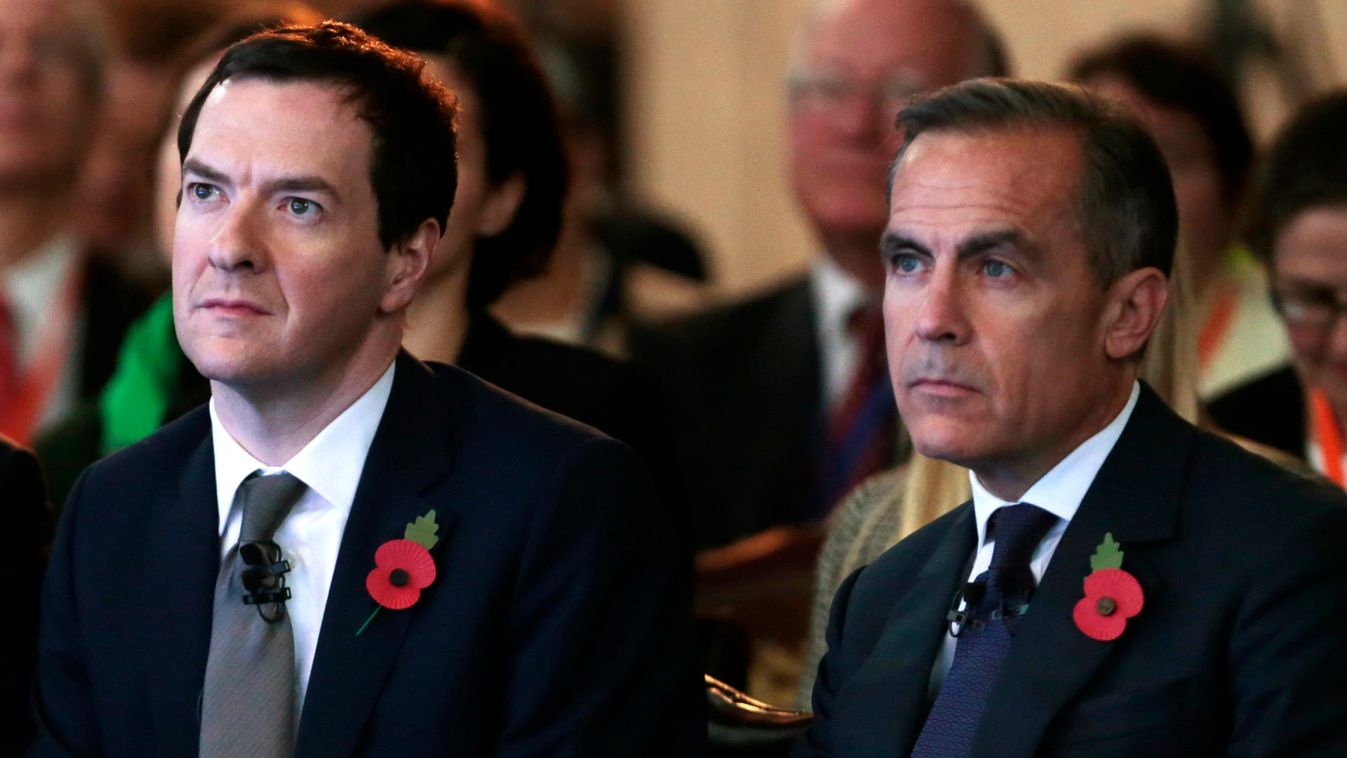Britain's Chancellor George Osborne sits with Bank of England governor Mark Carney at the Bank of England's Open Forum 2015 conference on financial regulation, in London