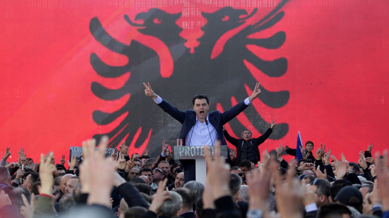 Albania's opposition Democratic Party leader Lulzim Basha speaks to his supporters during a protest against the government in front of Prime Minister Edi Rama's office, in Tirana