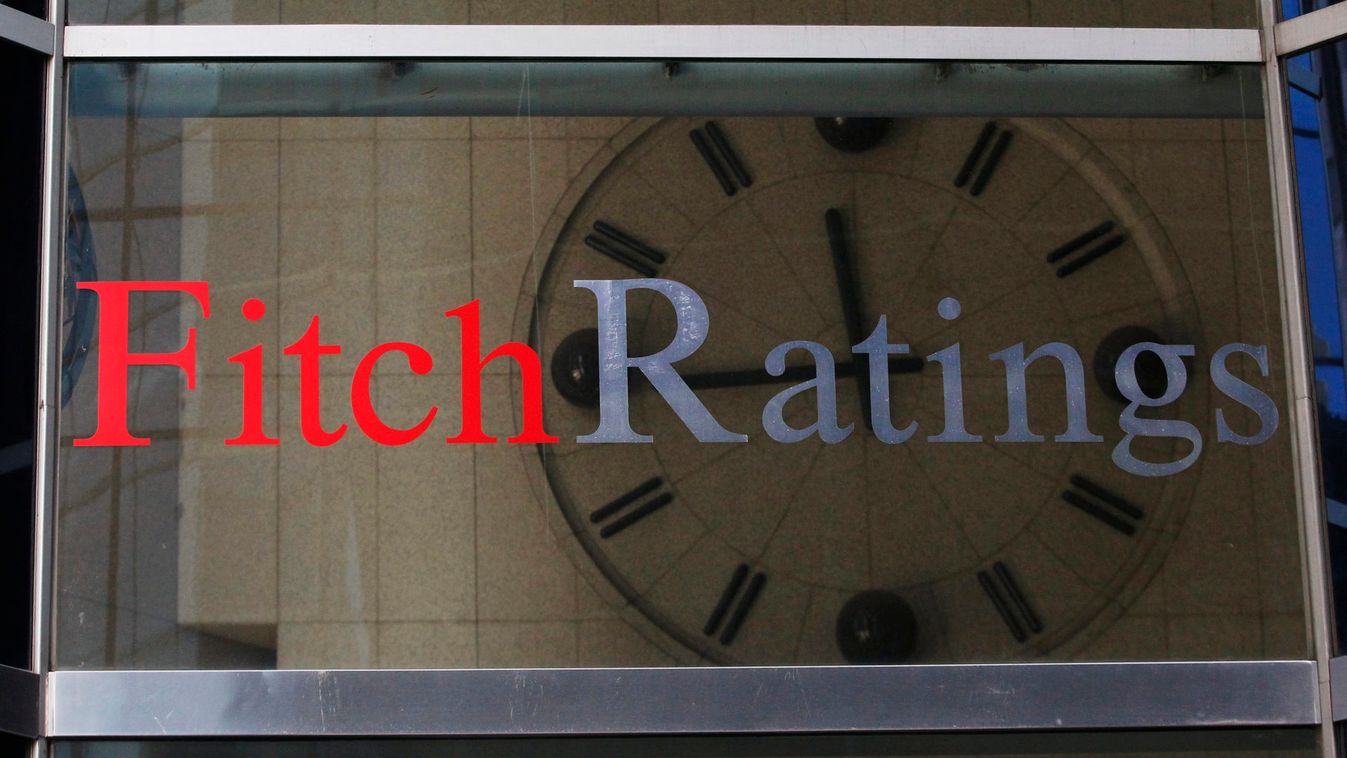A clock is seen inside the lobby of the headquarters of Fitch Ratings headquarters in New York