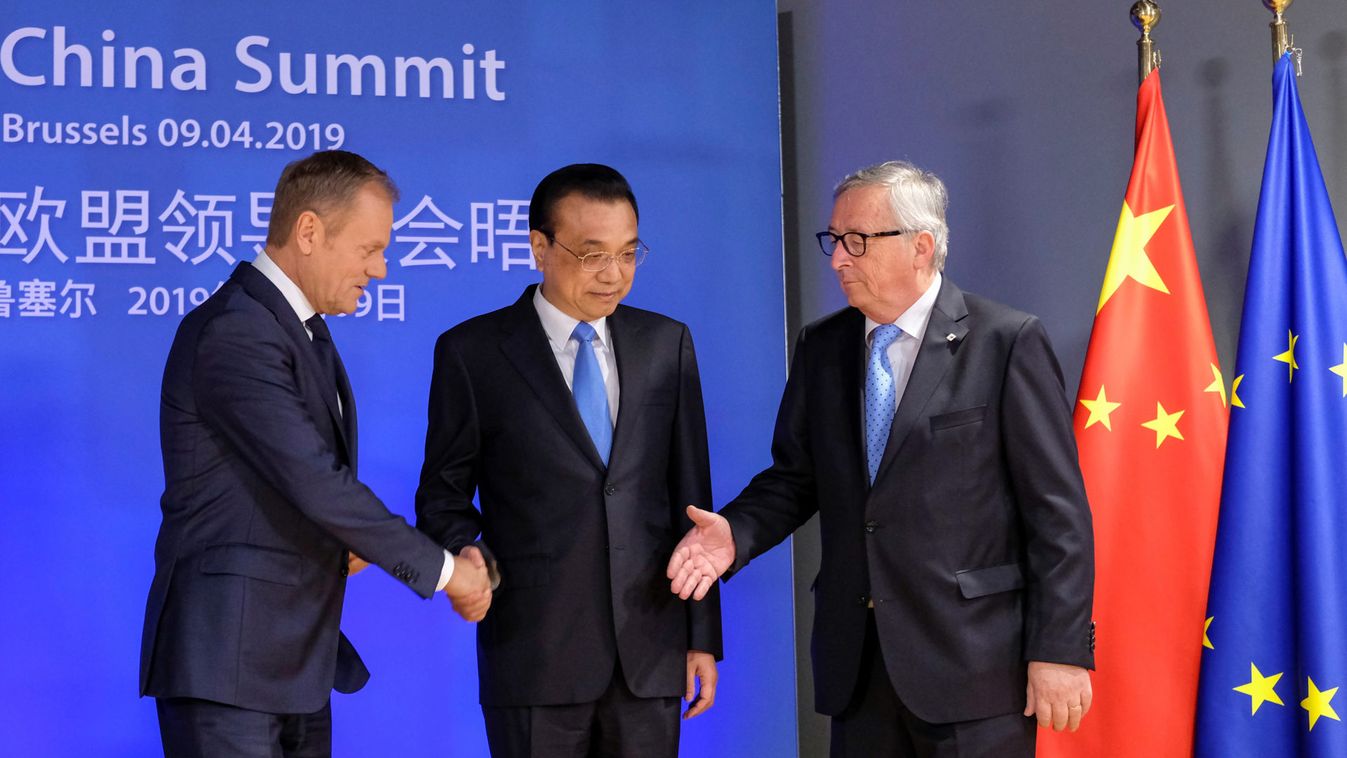 Chinese Premier Li Keqiang is welcomed by European Council  President Donald Tusk and European Commission President Jean-Claude Juncker  ahead of a EU China Summit in Brussels