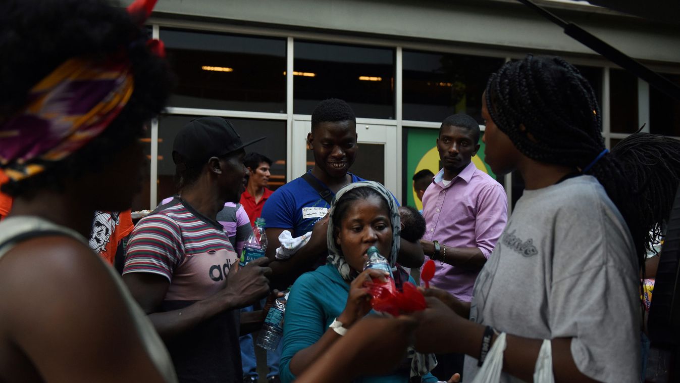 A Congolese immigrant delivers food to asylum seekers in San Antonio