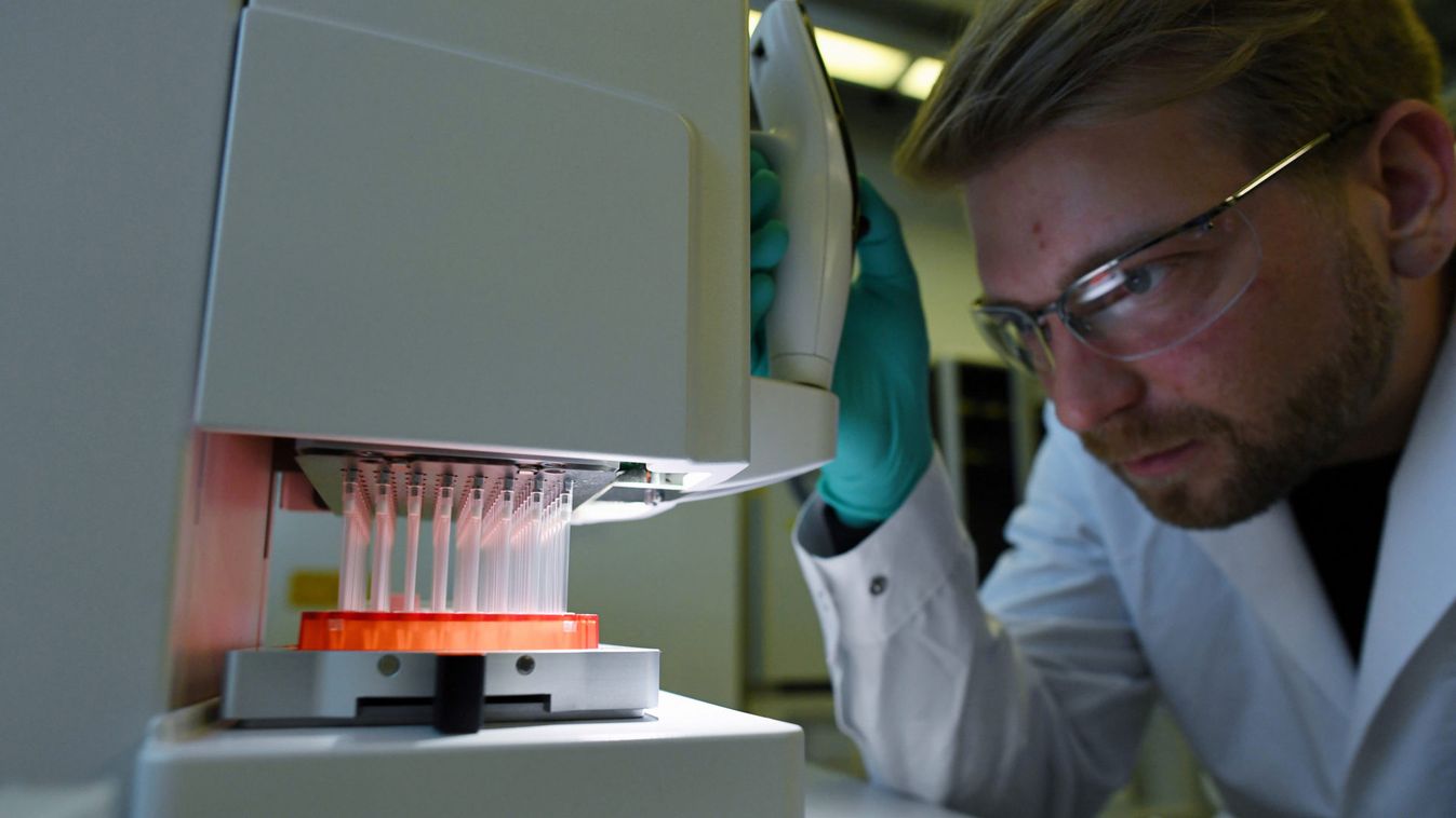 Employee Philipp Hoffmann, of German biopharmaceutical company CureVac, demonstrates research workflow on a vaccine for the coronavirus (COVID-19) disease at a laboratory in Tuebingen