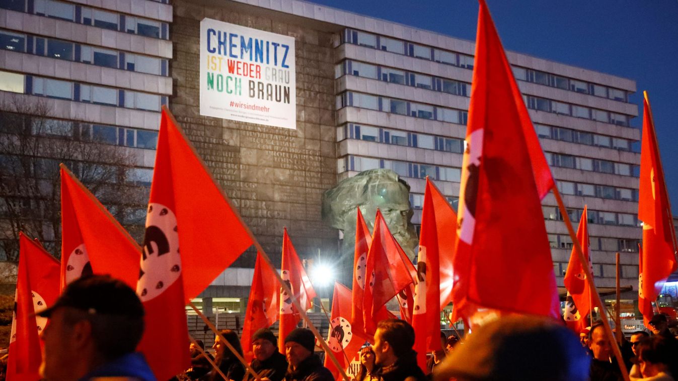 Protesters demonstrate during a visit of German Chancellor Angela Merkel in Chemnitz