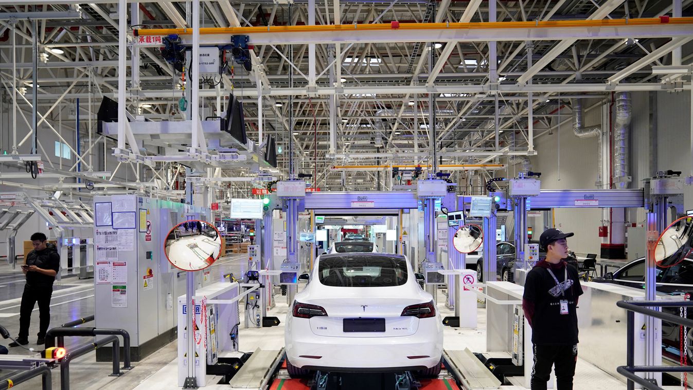 Tesla China-made Model 3 vehicles are seen during a delivery event at its factory in Shanghai