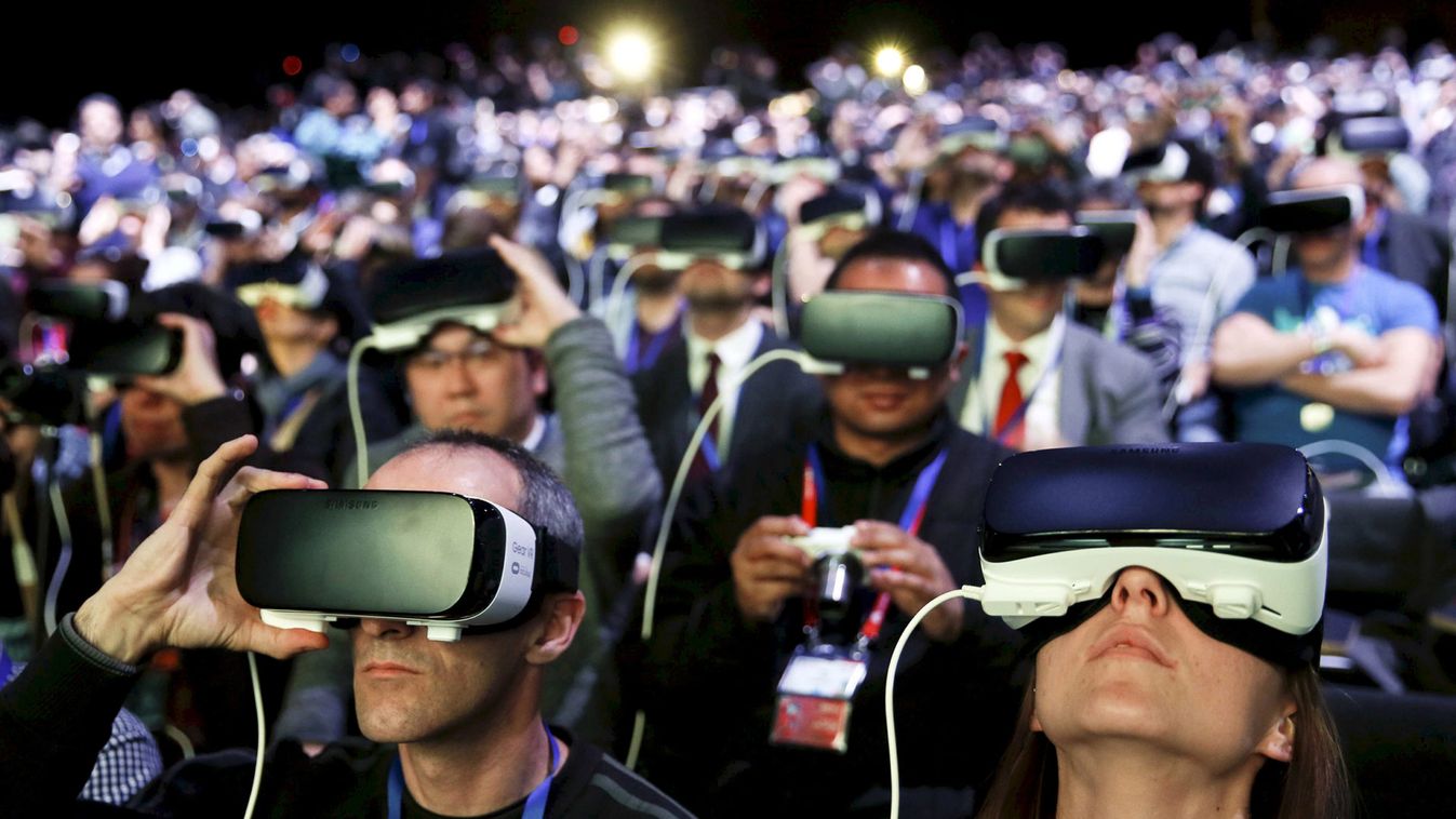 File photo of people wearing Samsung Gear VR devices in Barcelona