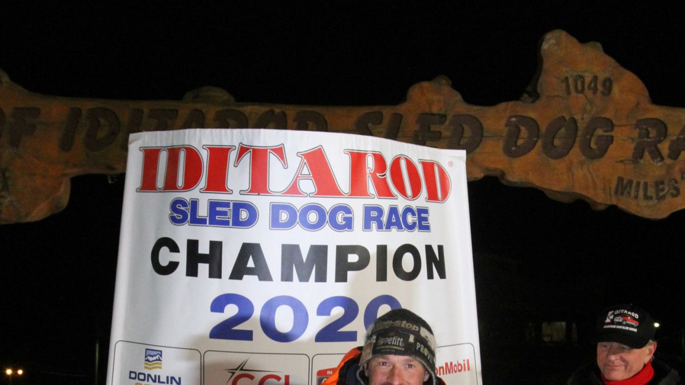 Norwegian musher Thomas Waerner poses with his lead dogs after he won the Iditarod Trail Sled Dog Race in Nome