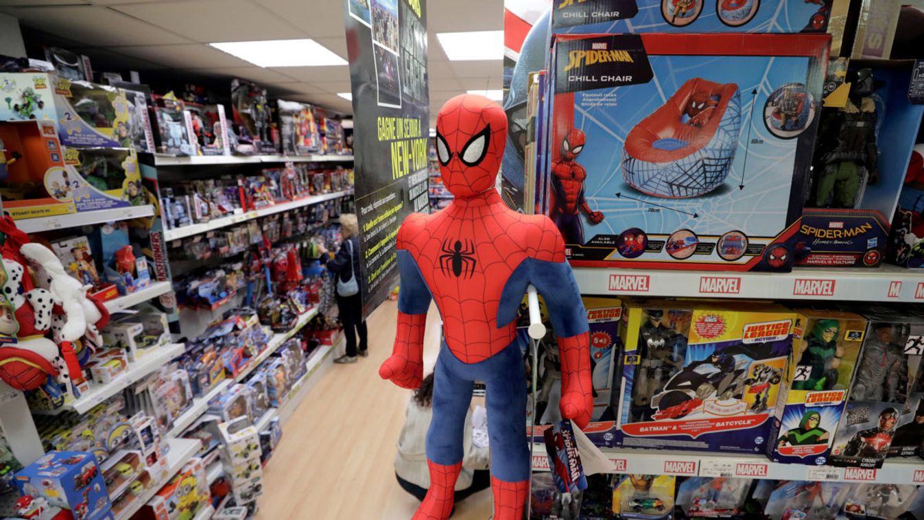 A customer looks at toys displayed for sale at the JoueClub Contesso shop in Nice