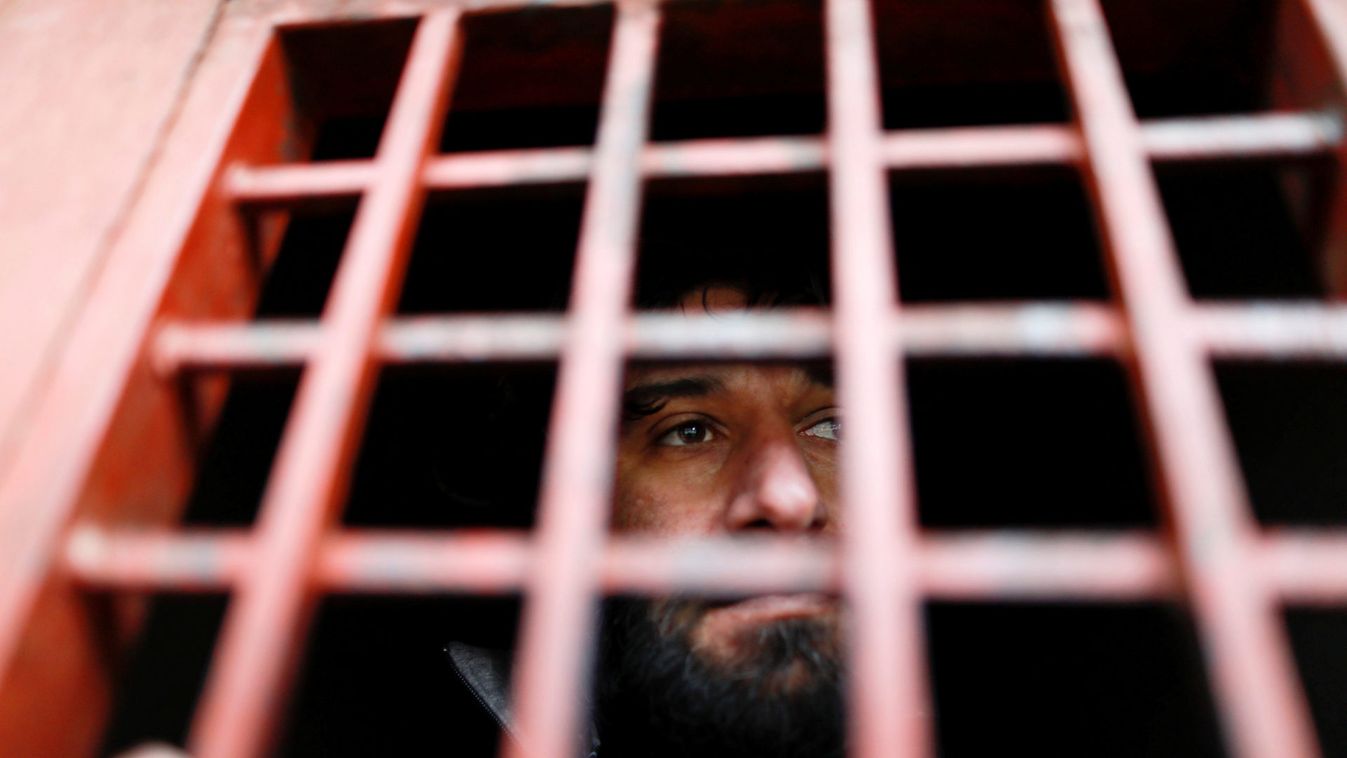 An Islamic State member looks out from a prison cell in Sulaimaniya