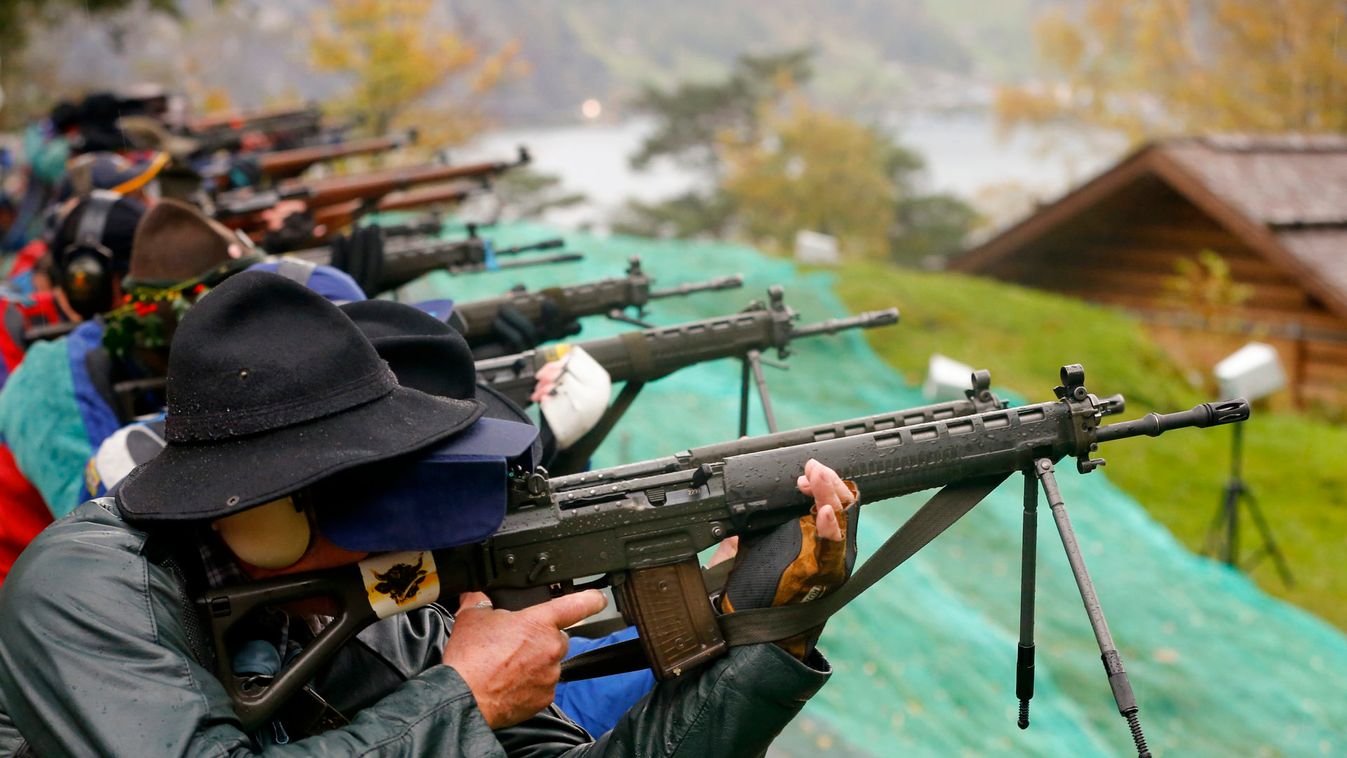 Participants fire their infantry and assault rifles during the traditional 'Ruetlischiessen' competition at the Ruetli meadow in central Switzerland