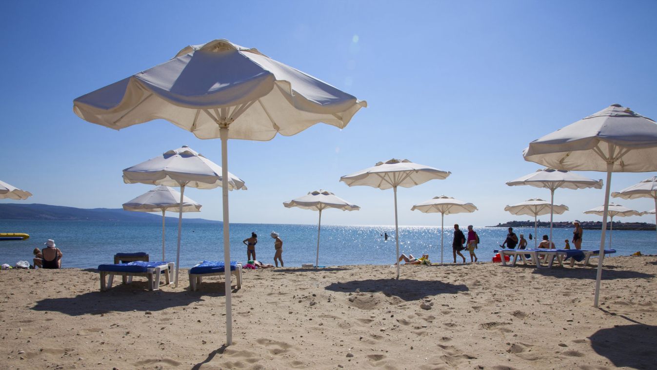 Bulgaria, Black Sea Coast, South Sunny Beach, People enjoying the Beach, Sunshades.