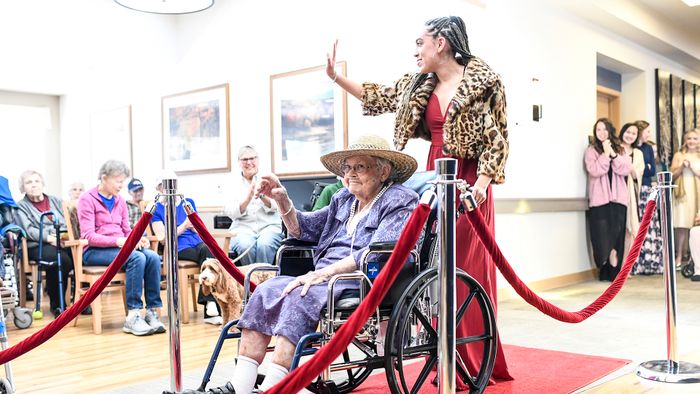 REGIS JESUIT STUDENTS GIVE SENIOR CITIZENS RED CARPET FASHION SHOW