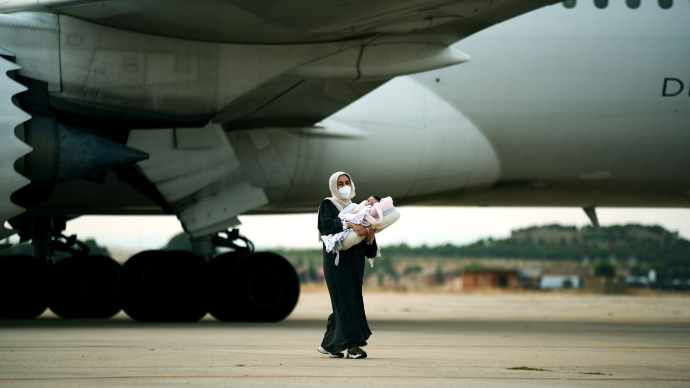 Afghan Evacuees Arrive At Torrejon Air Base In Spain