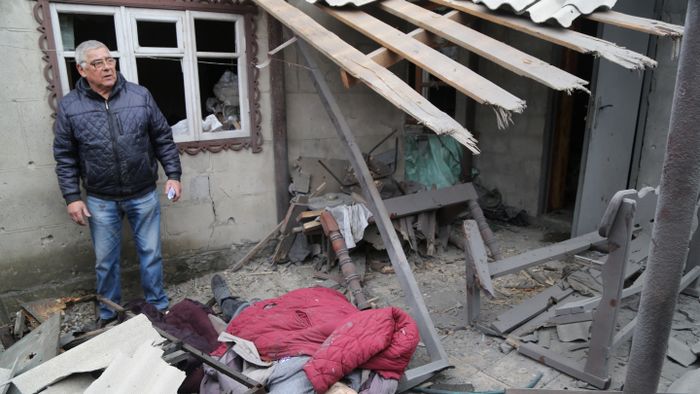 A destroyed buildings allegedly targeted by shelling in Donetsk