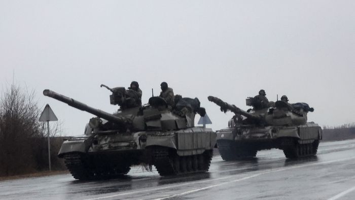 Tanks move into the city, after Russian President Vladimir Putin authorized military operation in eastern Ukraine, in Mariupol