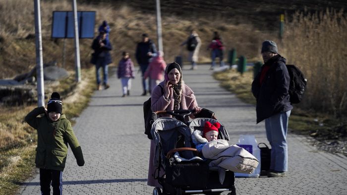 People arrive in Poland after fleeing Ukraine