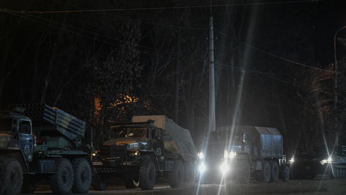 Russian military tanks and armored vehicles advance in Donetsk