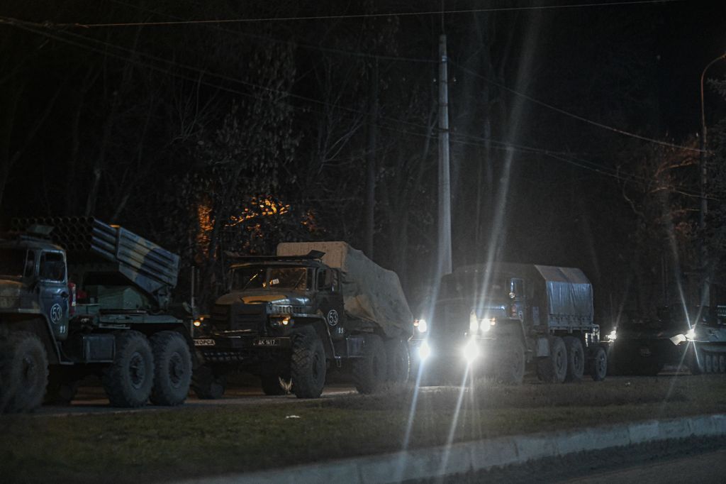 Russian military tanks and armored vehicles advance in Donetsk