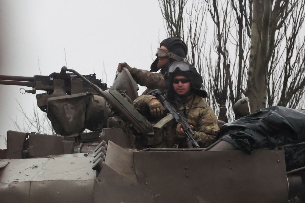 Tanks move into the city, after Russian President Vladimir Putin authorized military operation in eastern Ukraine, in Mariupol