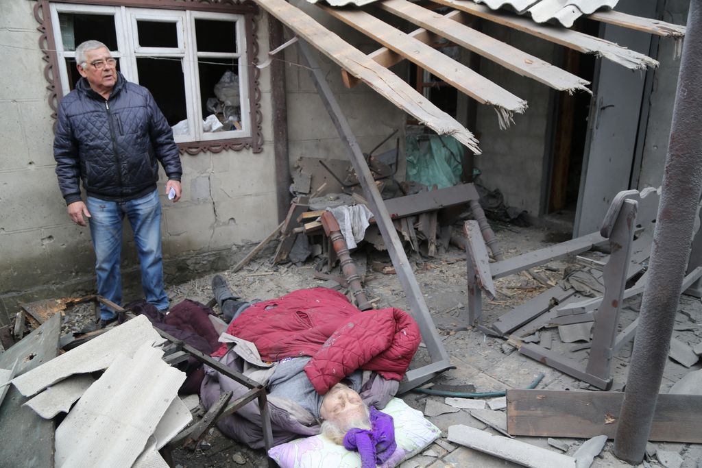 A destroyed buildings allegedly targeted by shelling in Donetsk