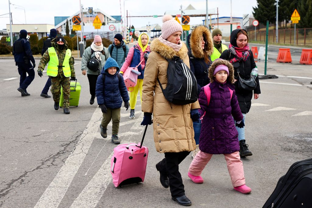 People fleeing Russia's invasion of Ukraine arrive in Korczowa