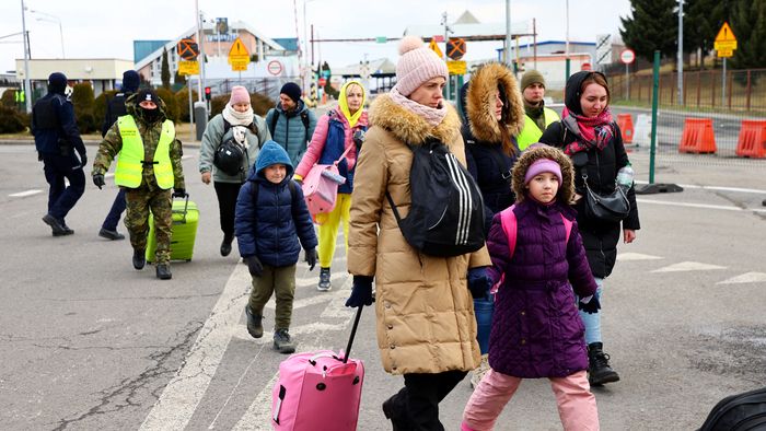 People fleeing Russia's invasion of Ukraine arrive in Korczowa