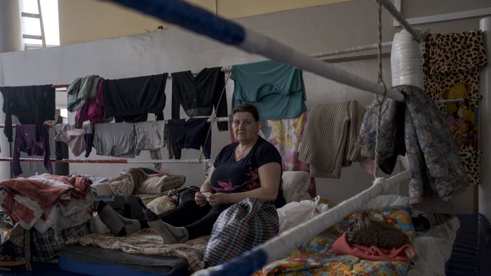 Civilians take shelter at sports hall of Lviv Polytechnic University