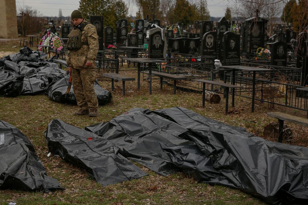 Russian Retreat From Bucha Reveals Scores Of Civilian Deaths