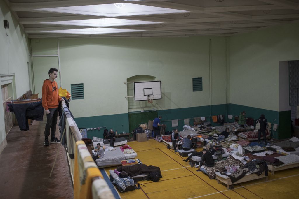 Civilians take shelter at sports hall of Lviv Polytechnic University