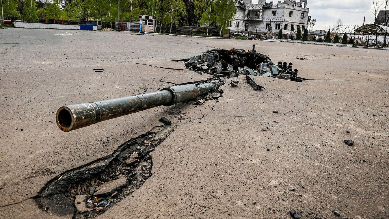 A destroyed Russian tank's turret is seen stuck in the ground, amid Russian invasion of Ukraine in Zalissia
