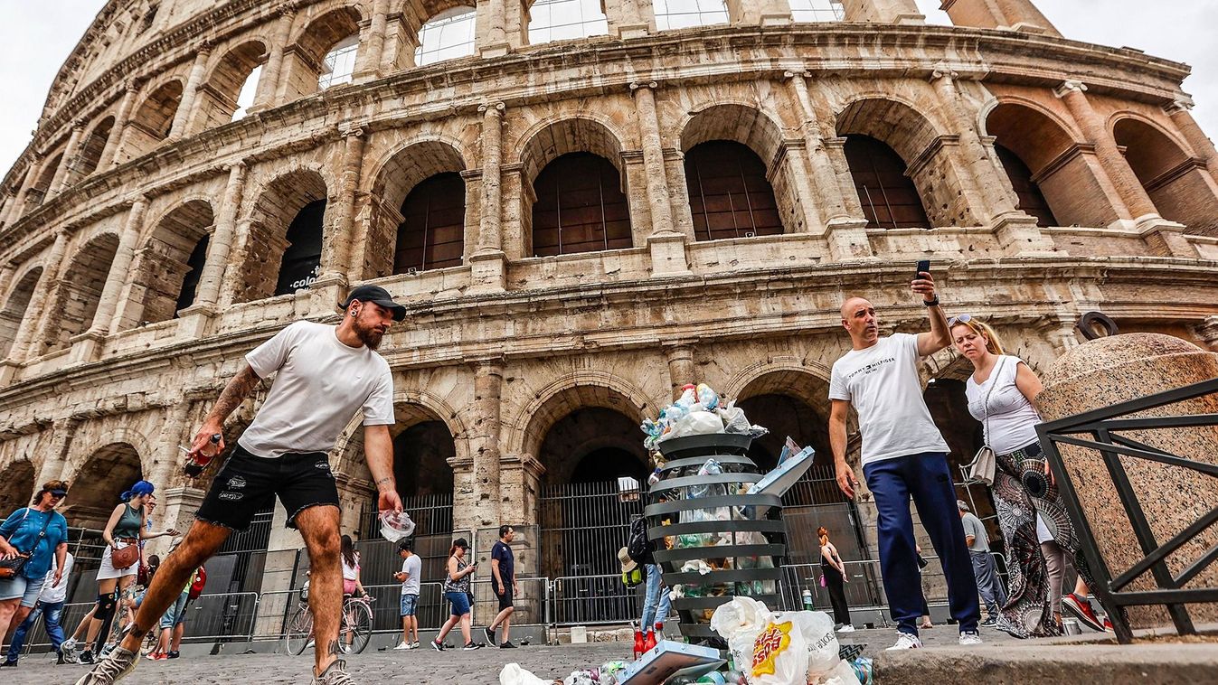 Tourists, guides, litter and fences at the Colosseum