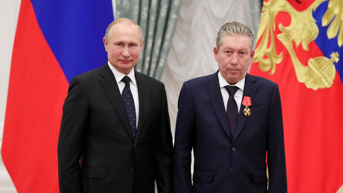 Russian President Putin and Lukoil First Executive Vice President Maganov attend an award ceremony in Moscow