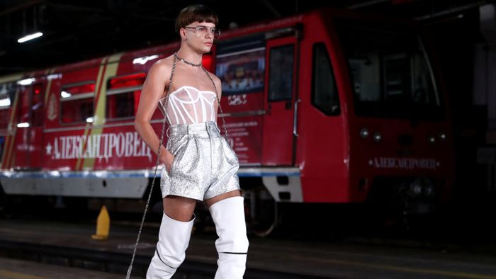 A model presents a creation by Alexander Arutyunov at the metro depot during the Mercedes-Benz Fashion Week Russia in Moscow