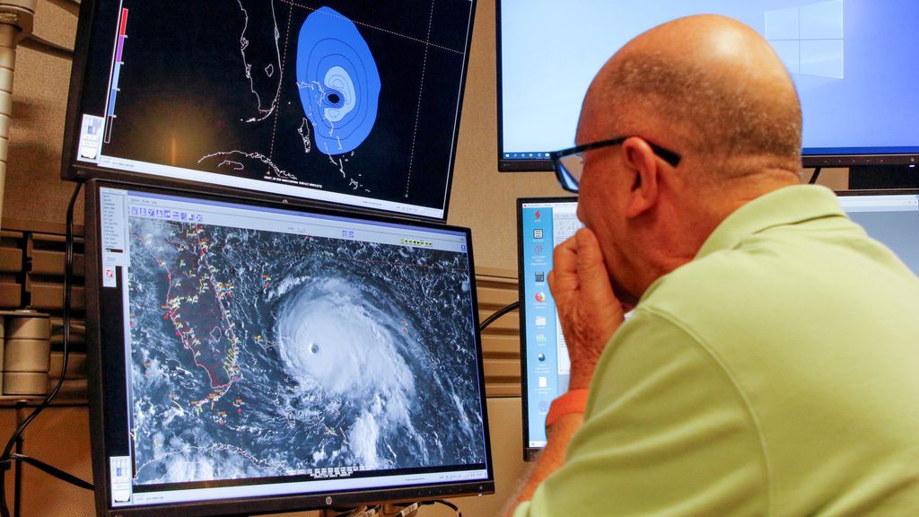 Dr. Lixion Avila, Senior Hurricane Specialist, prepares a forecast at the National Hurricane Center ahead of the arrival of Hurricane Dorian in Miami