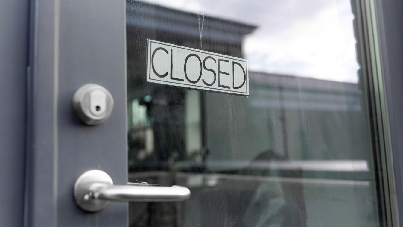 hitel
glass door of closed shop or office