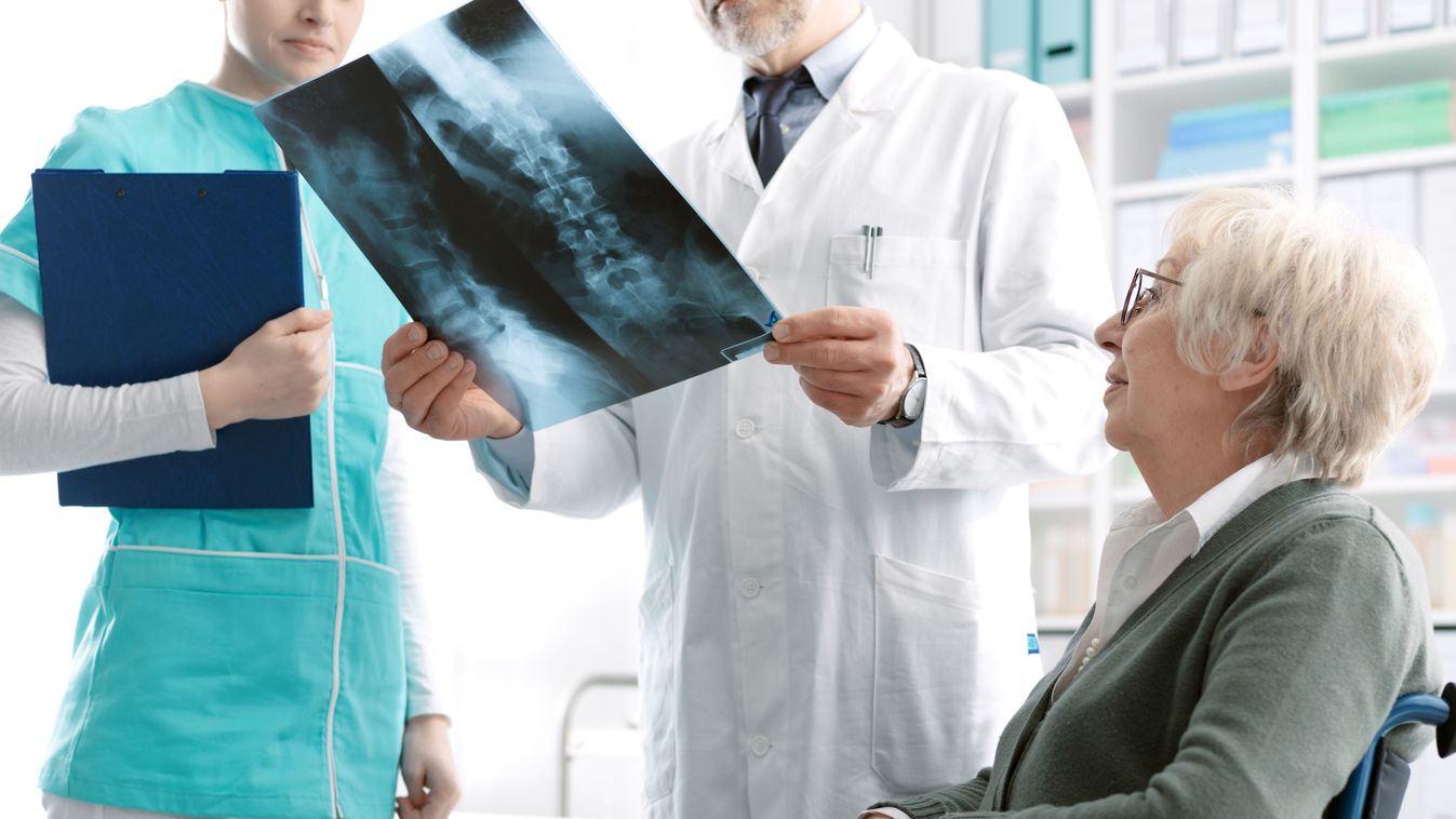 Doctor,Checking,A,Senior,Female,Patient's,X-ray,Image,During,A