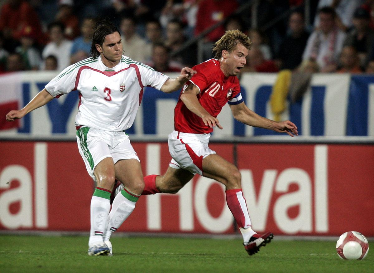 Austria's Ivanschitz and Hungary's Horvath fight for the ball during international friendly soccer match in Graz