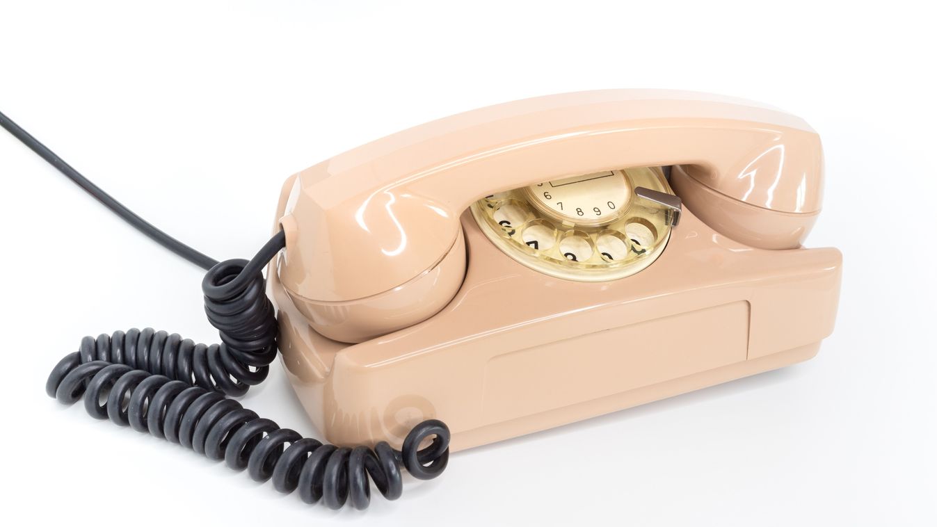 Oldschool,Pink,Telephone,On,A,White,Background.,Telecommunication.,Vintage,Objects.