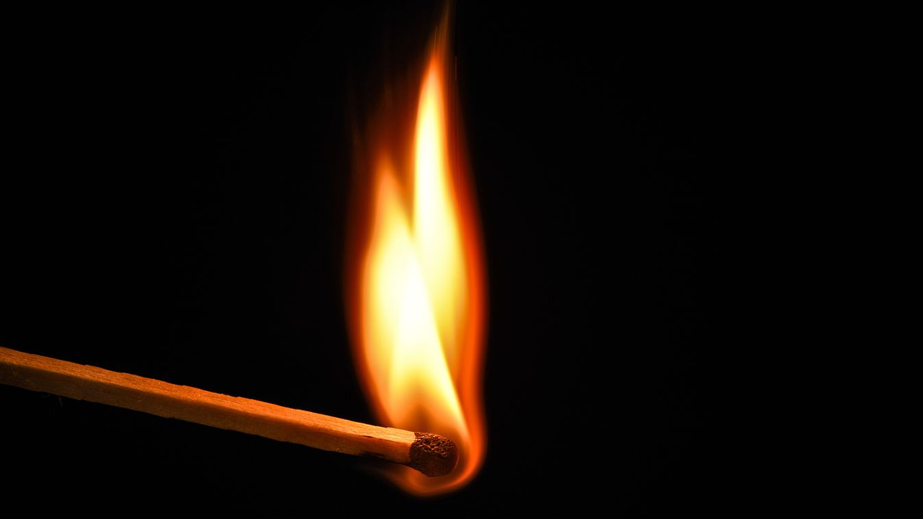 Fire,Burning,On,Matchstick.,Isolated,On,Black,Background.