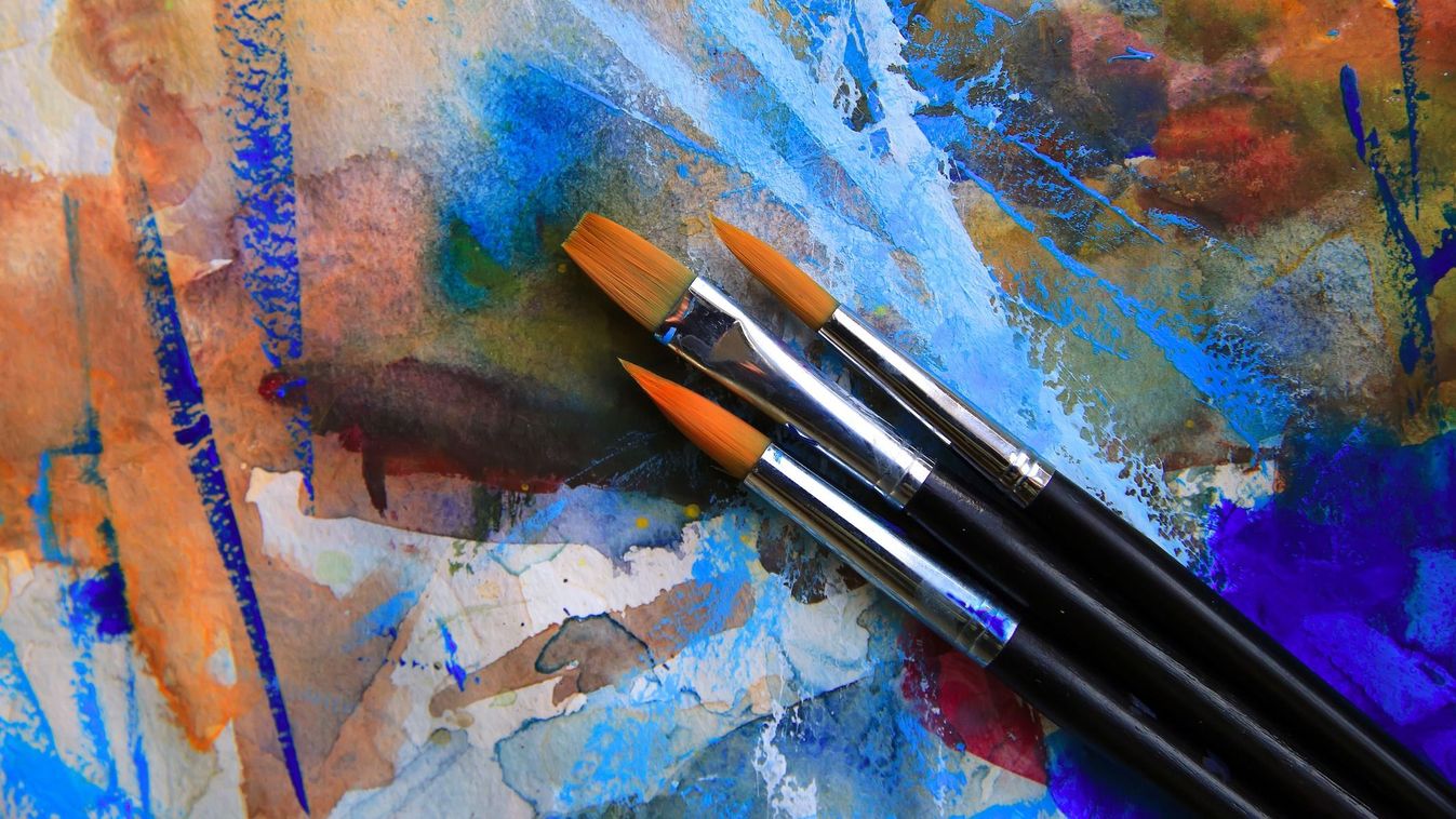 Closeup of brushes and palette.