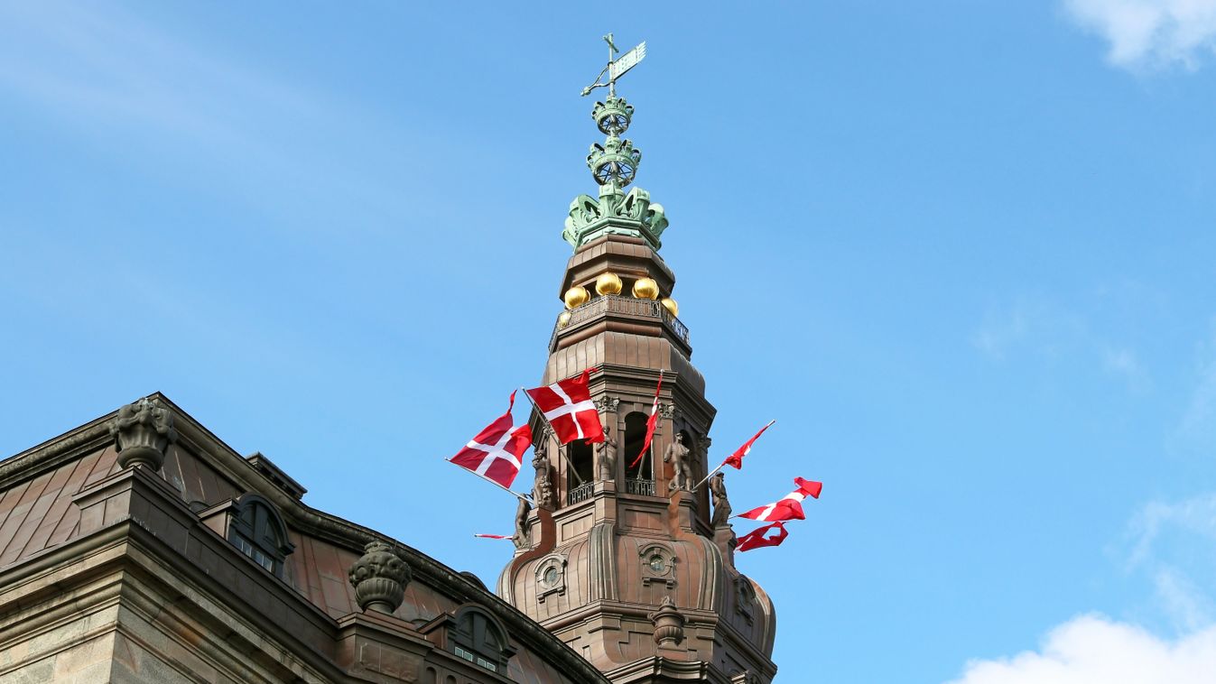 Tower,Of,Christiansborg,Castle,With,Danish,Flag.,Copenhagen,,Denmark.