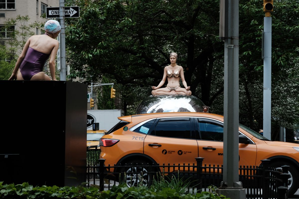 Artist Carole Feuerman's Realistic Sculptures Of Swimmers Adorn Manhattan's Park Avenue