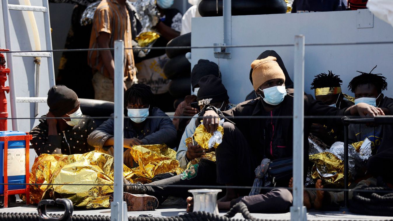 Migrants at the reception center on the Italian island of Lampedusa